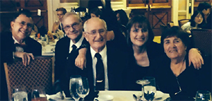 From left to right: Drs. Thomas Carroll, Richard Hughes, and Ralph Roberts with Jean Roberts (daughter of Dr. Roberts and Rita Roberts, wife of Ralph Roberts) at the 2015 AAID conference in Las Vegas, Nevada, where Dr. Hughes presented the AAID Isaih Lew Memorial Research Award to Dr. Ralph Roberts
